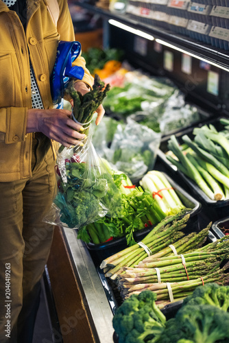 Choosing Fresh Vegetables at the Grocery Store