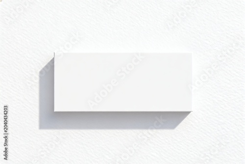 Minimalist White Box on Textured Wall