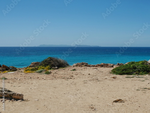 Photography Coastal landscape of the Salines on Mallorca with dry foreground and blue sea