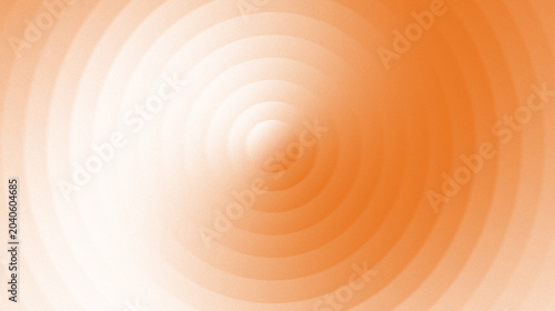 Abstract graphic with orange  concentric circle design.