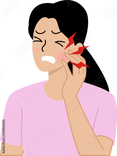 woman with a pained expression holding her aching cheek suggesting. toothache