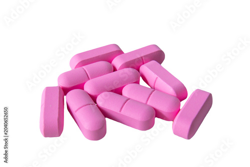 Obraz na płótnie Pink pills, medicine isolated on white background, top view
