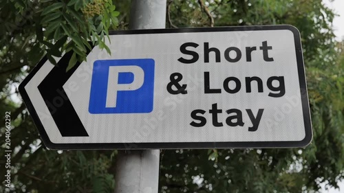 Cutaway shot. Short and long stay parking sign. 