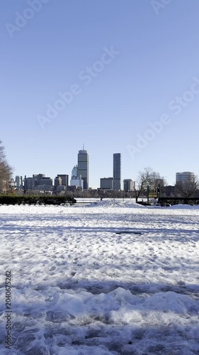 Snow-covered MIT, with skyline view. 