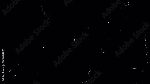 Small white wires and worn dots on a black background. Damaged old film effect in 4K with alpha channel. Animation with scratches and grain.