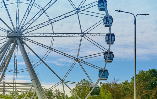 Ferris wheel, city park. Close-up.