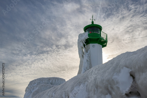 Sassnitz Lighthouse in winter with snow