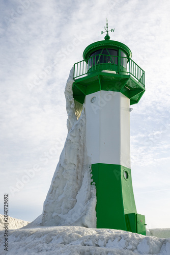 Sassnitz Lighthouse in winter with snow