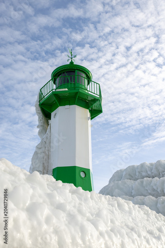 Sassnitz Lighthouse in winter with snow