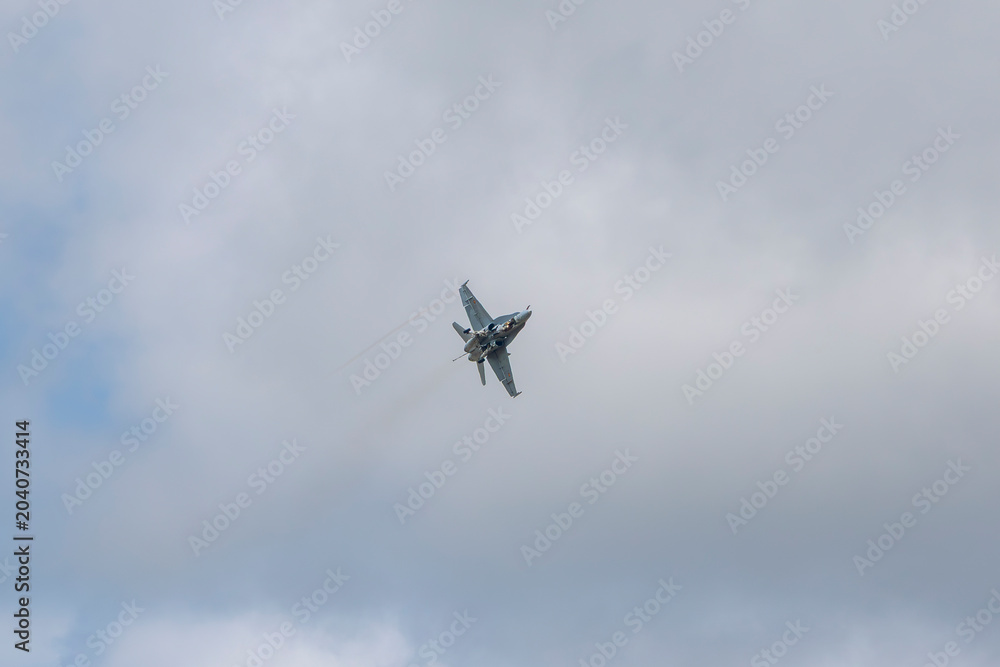 Obraz premium F/A-18 An F/A-18 performing maneuvers with its landing gear deployed at an air show in Salamanca, Spain May 10, 2026