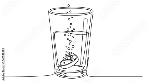Bild auf Leinwand Effervescent tablet dissolving in a glass of water with bubbles in continuous li
