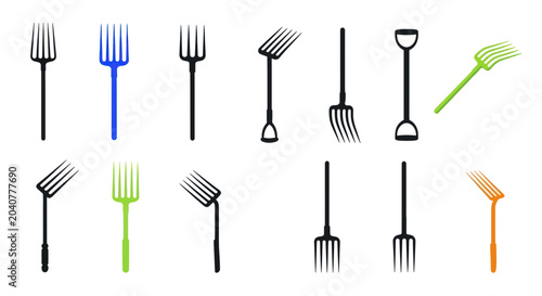 Bild auf Leinwand Gardening Tools Set: Pitchforks and Shovel Head Isolated on White