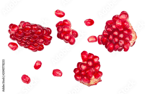 Ripe pomegranate fruit isolated on a white background