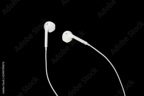 Valokuva Isolated, Straight Shot  : Sleek Audio Devices: Isolated Earbuds for Minimalism and Design