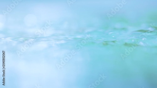 waves on the blue water surface close-up