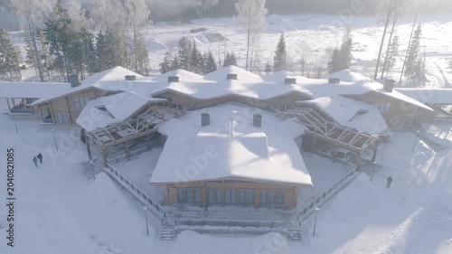 Aerial drone ascent above winter resort