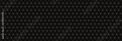 Fotografie Black perforated metal background