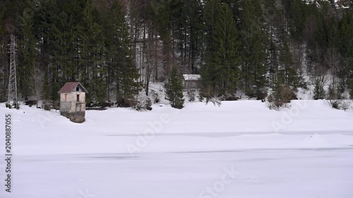 A winter of magic and mystery. Lake Predil in winter. Tarvisio.