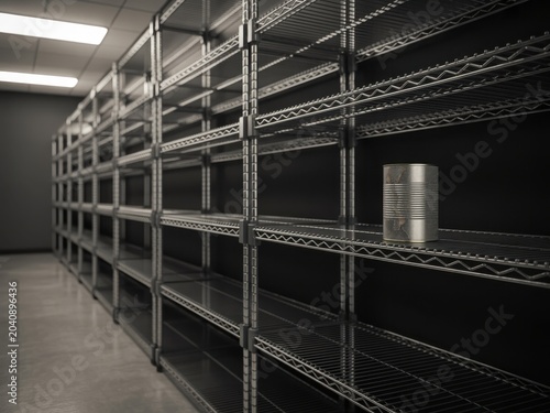 Empty industrial metal wire shelving units in a dark facility room with a single solitary cylindrical container on a polished concrete floor