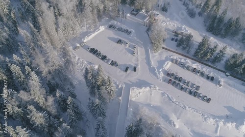 Aerial drone pull back over car park