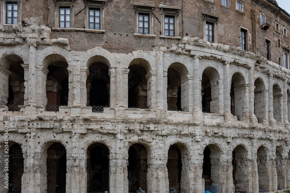 Naklejka premium Architectural history in details of ruins, old buildings, walls, amfitheatres, arches in old part of Rome, dated from 300 BC, guided tours in Rome, Italy