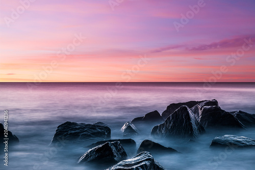 Sonnenuntergang am Meer mit Graufilter Fotografie