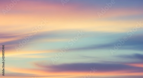 Soft Pastel Sunset Clouds Spreading Across Colorful Evening Sky