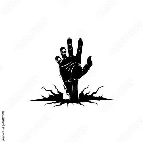 Fotografie Black hand rising from ground dirt.