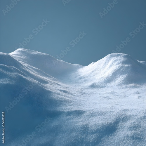 Snowy mountain peaks under clear blue sky, winter landscape with soft white snow drifts and icy textures, arctic wilderness mountain range, serene alpine scenery for seasonal backgrounds