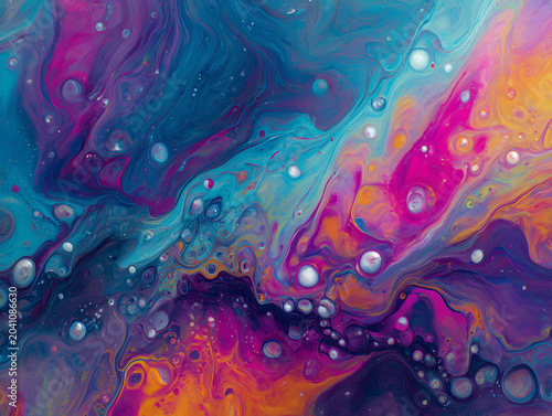 Abstract fluid art background creating vibrant colorful texture