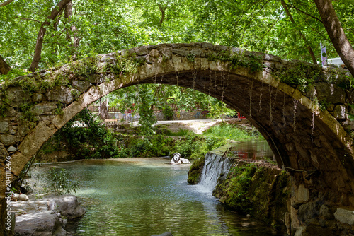 Bridge over the river at the city of Livadia in Greece. Travel concept.