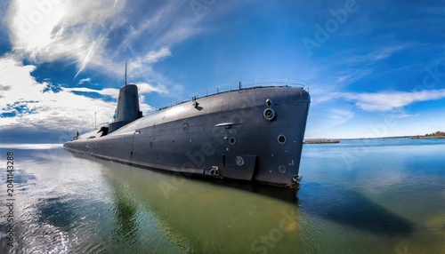 A submarine is anchored in the bay, silently navigating the calm waters with its sleek silhouette. Generated with AI
