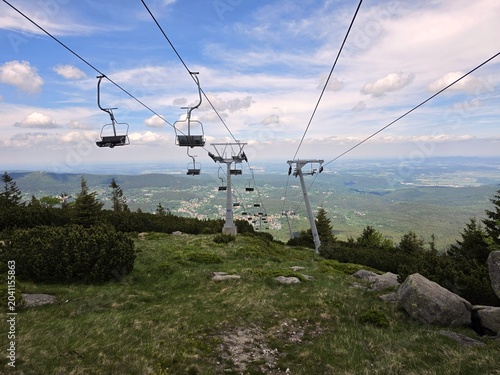 Chairlift Cables and Chairs with Scenic Mountain Valley View