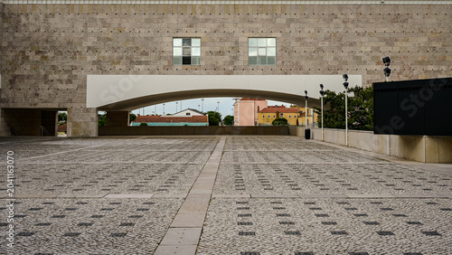 Modern Stone Plaza and Curved Architectural Archway in Lisbon Portugal