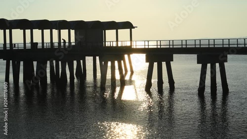 The Jekyll Island Fishing Pier located on Jekyll Island, Georgia. The pier is situated in the Clam Creek Picnic Area
