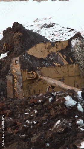 Blades Chop Icy Soil. Powerful Hydraulic Systems Operating To Fracture Frozen Earth And Snow Layers . Stock clip