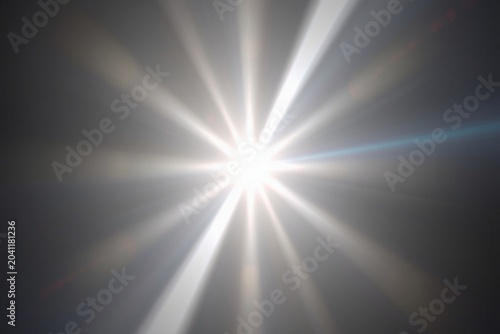 A glowing white light flare Photoshop overlay effect. A realistic, bright light ray soft gradient on a transparent background high-quality effect, photo and videos for editors. luminous shine