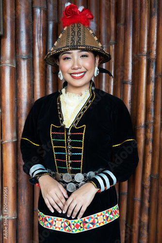 Portrait of Kadazan Dusun girl in Papar traditional attire during Kaamatan Festival in Kota Kinabalu Sabah Malaysia