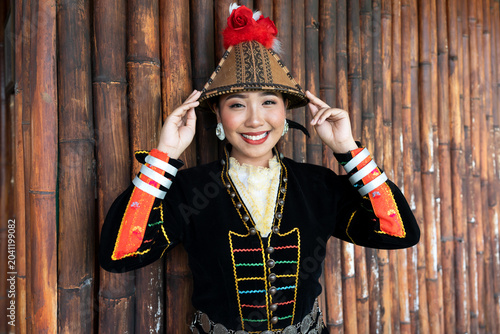 Portrait of Kadazan Dusun girl in Papar traditional attire during Kaamatan Festival in Kota Kinabalu Sabah Malaysia