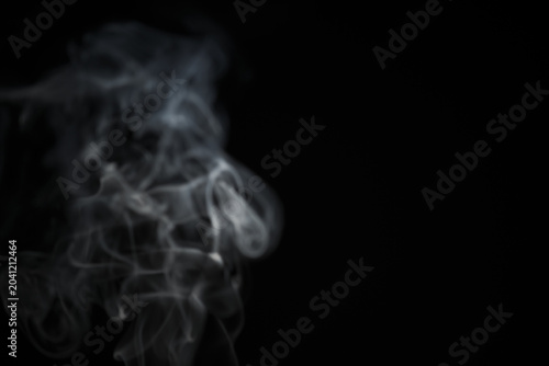 Photos White natural wave smoke abstract texture on black background with copy space
