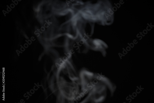 Canvas Print White natural wave smoke abstract texture on black background with copy space