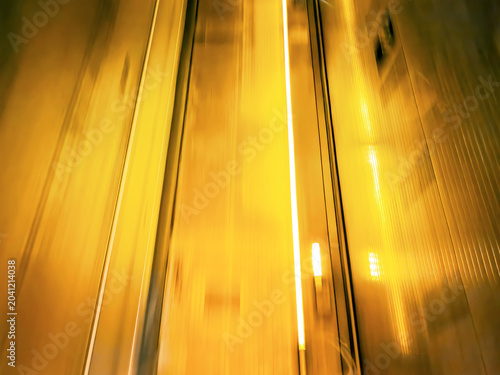 Εκτύπωση καμβά abstract golden motion blur at night representing high-speed public transit and