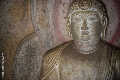 Photos Taiyuan, China - May 7 2026: Ancient Buddhist statue in the Tianlong Mountain Gr