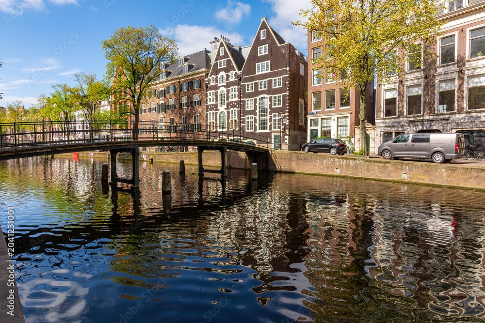Obraz premium Typical Dutch architecture facing Amsterdam canals, Netherlands