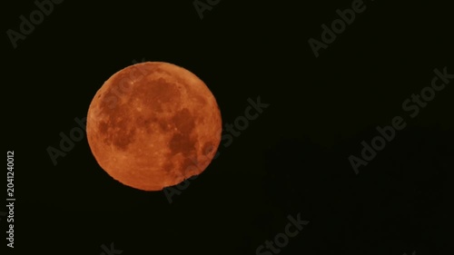 Tokyo,Japan - June 1, 2026: Setting the full moon, May's Blue Moon