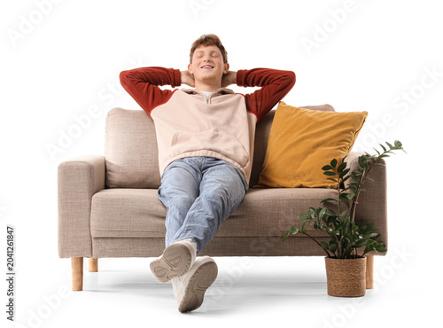 Redhead young man resting o...
