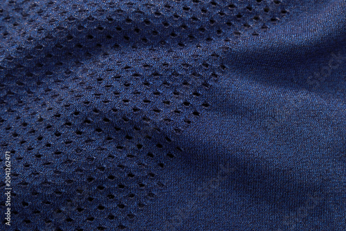 
A close-up of fabric background in blue and black