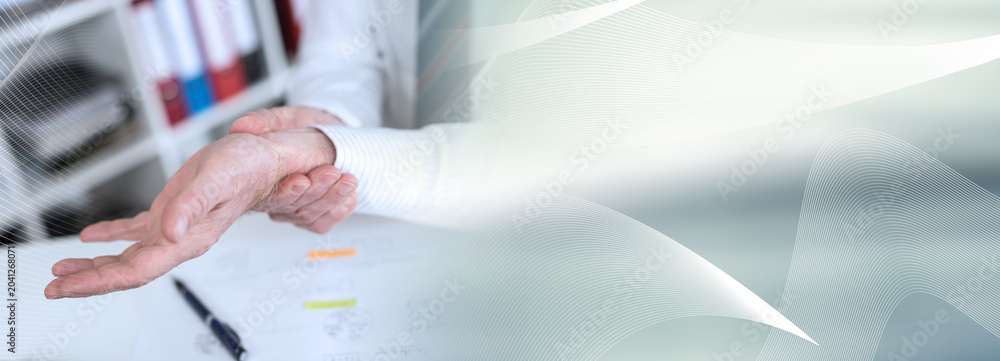 Fototapeta premium Businessman suffering from wrist pain; panoramic banner