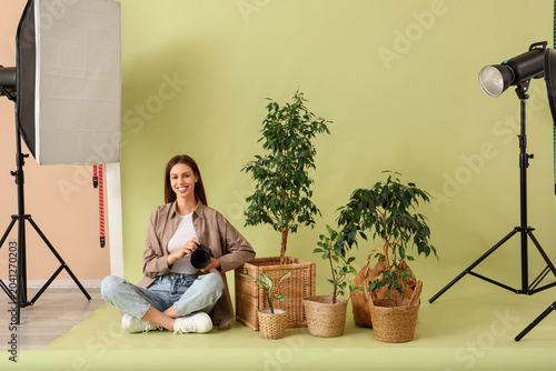 Female photographer with ca...