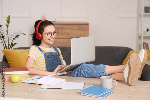 Teenage girl in headphones ...